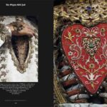Ornate medieval armor with intricate red heart.