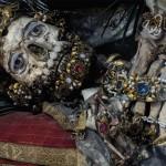 Jeweled skeleton adorned with ornate decorations.