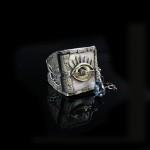 Decorative box with eye and gemstone.
