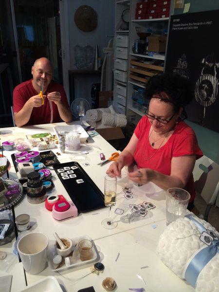 People crafting at a table together.